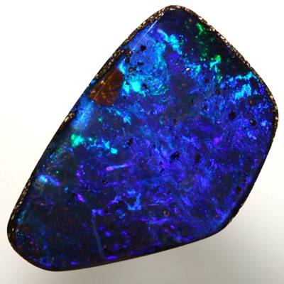 SOLID BOULDER OPAL Bright, strong blue greens. SEE VIDEO